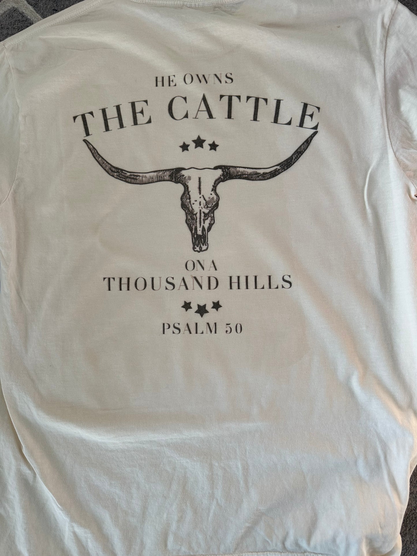 He owns the cattle T-shirt